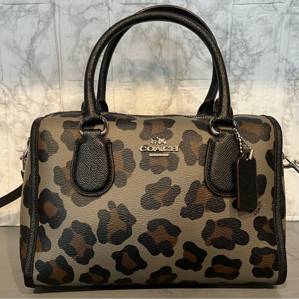 NWOT Coach mini dark tones leopard print with silver hardware.